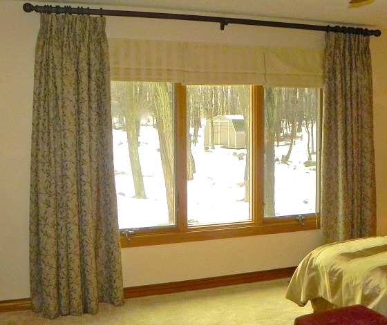 Drapery panels with roman shades